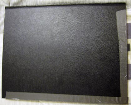 back of duct-taped sketchbook