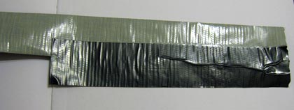 overlaying duct tape strips
